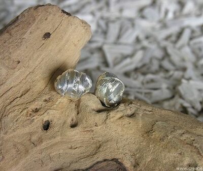 Ovaal gevlochten, 29x12mm, zilverkleur